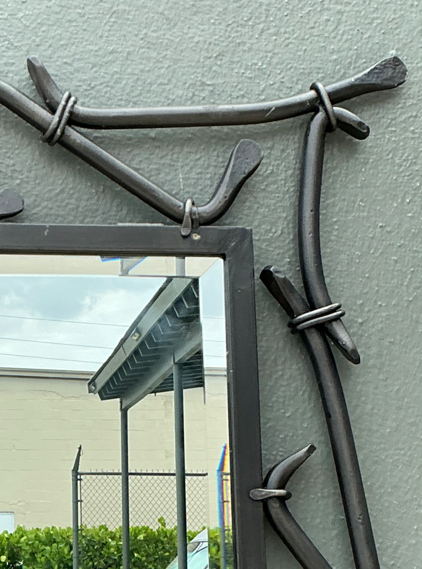 Alexandra Diez Mirrored Glass and Metal Wall Mirror - Side view