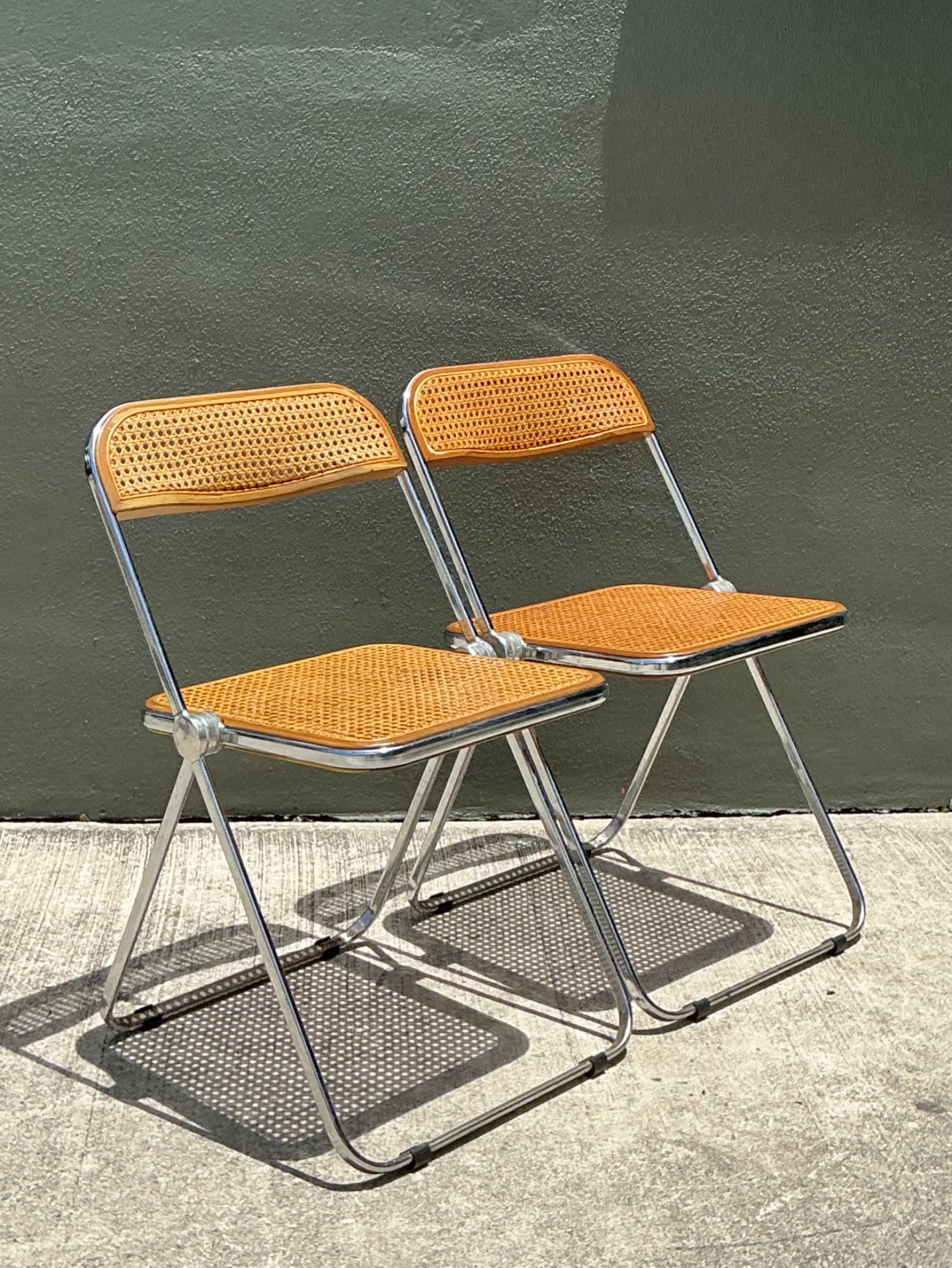 Vintage Italian Chrome And Cane Folding Chairs - A Pair - Side view