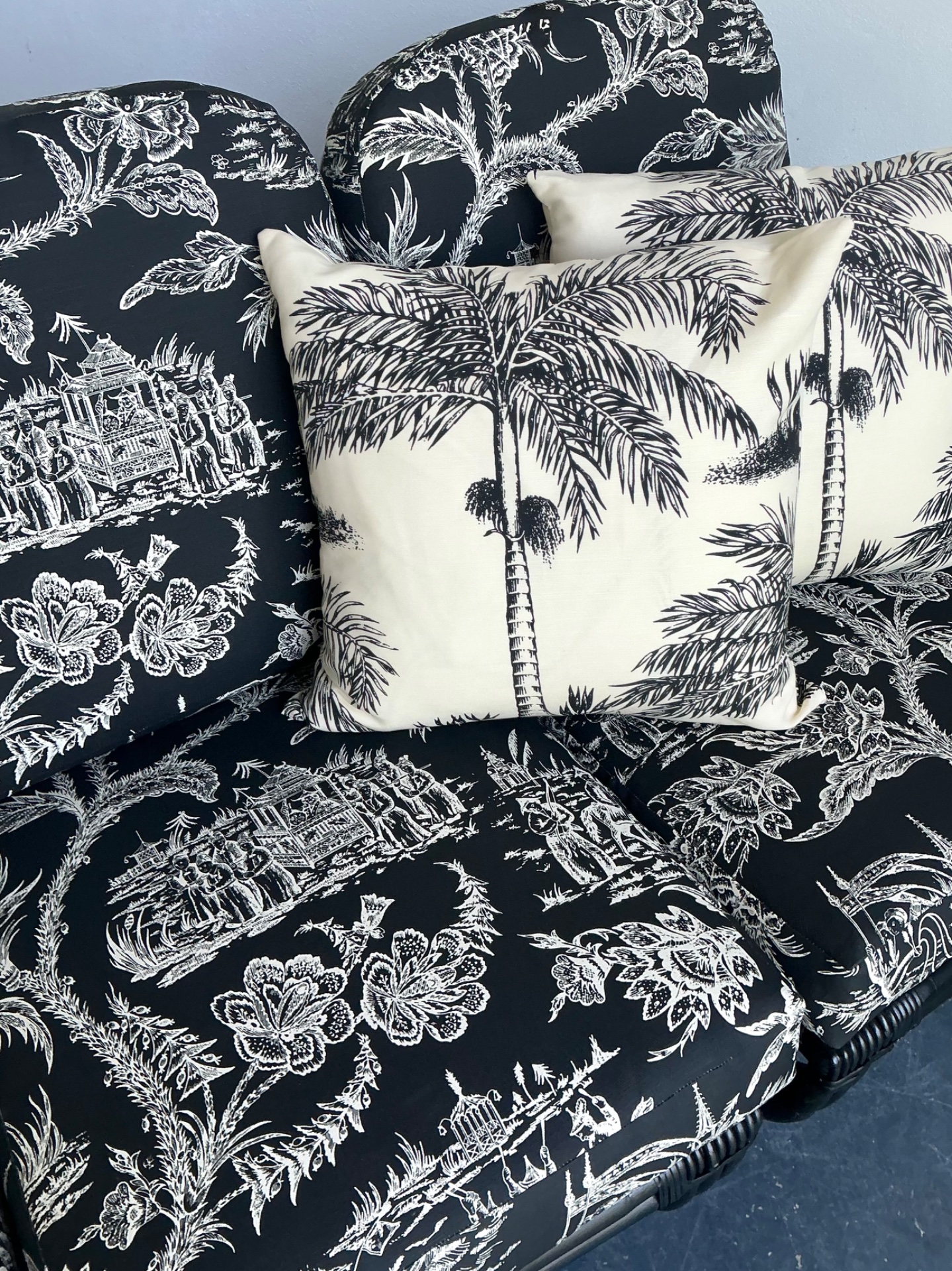 Vintage Black Rattan Sofa In Quadrille “Royal Journey” - Side view