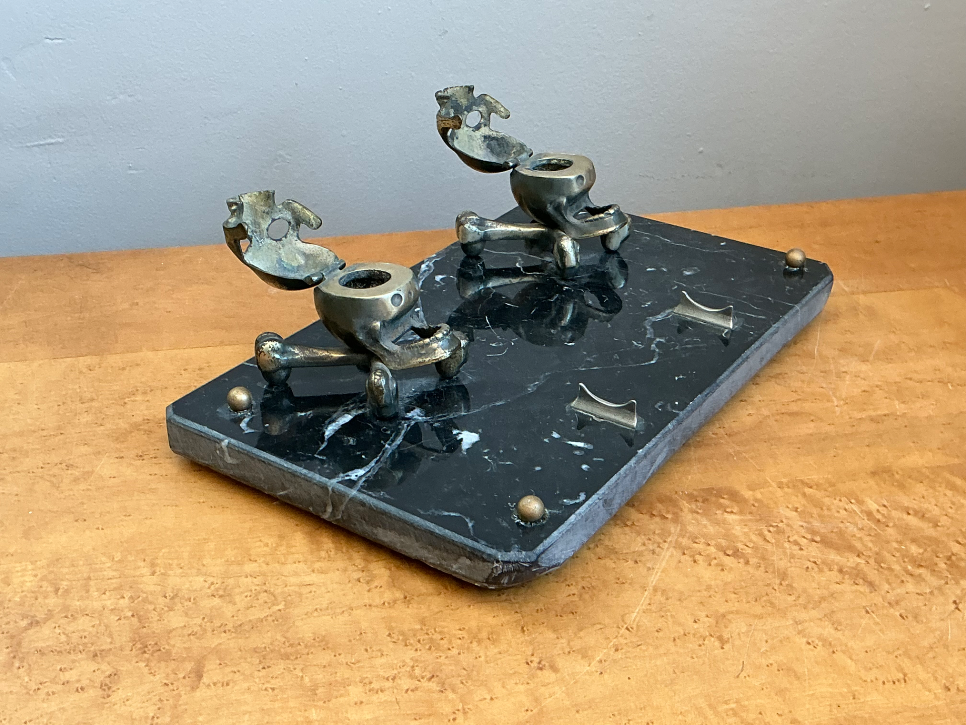 Vintage Brass Skull and Crossbones Inkwell - Side view