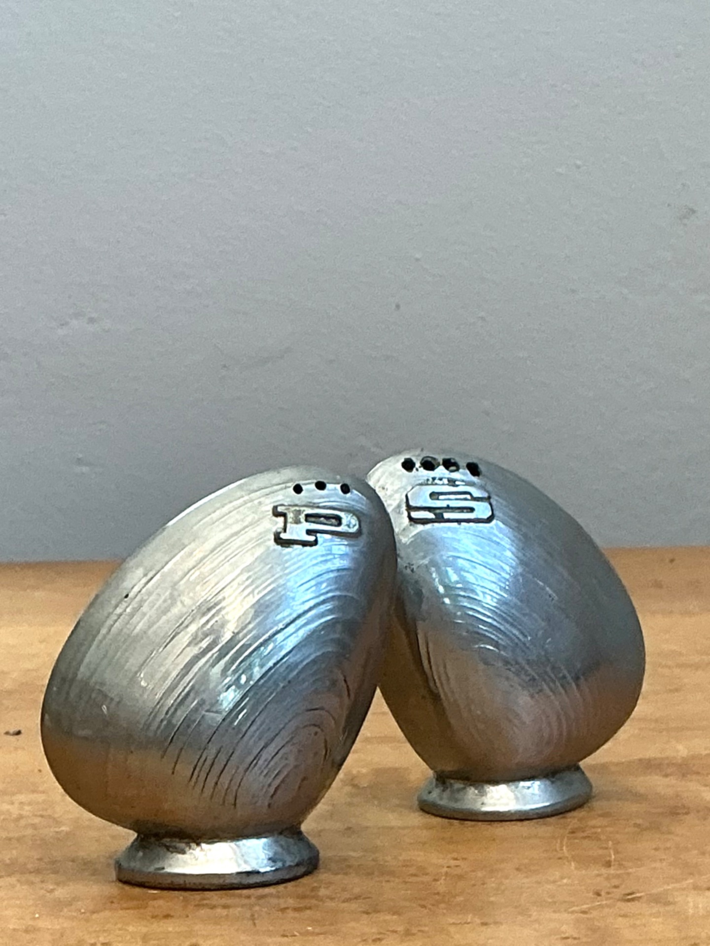 Vintage Metal Clamshell Salt and Pepper Shakers - Side view