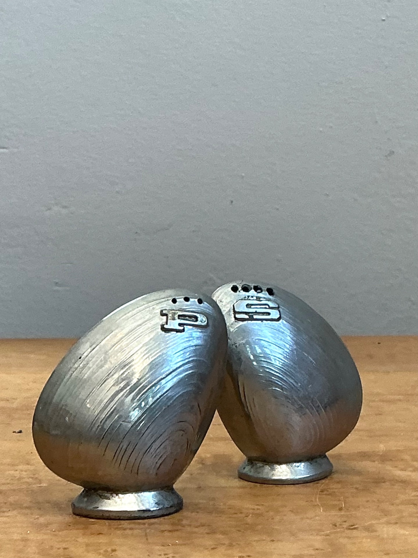 Vintage Metal Clamshell Salt and Pepper Shakers - Top view