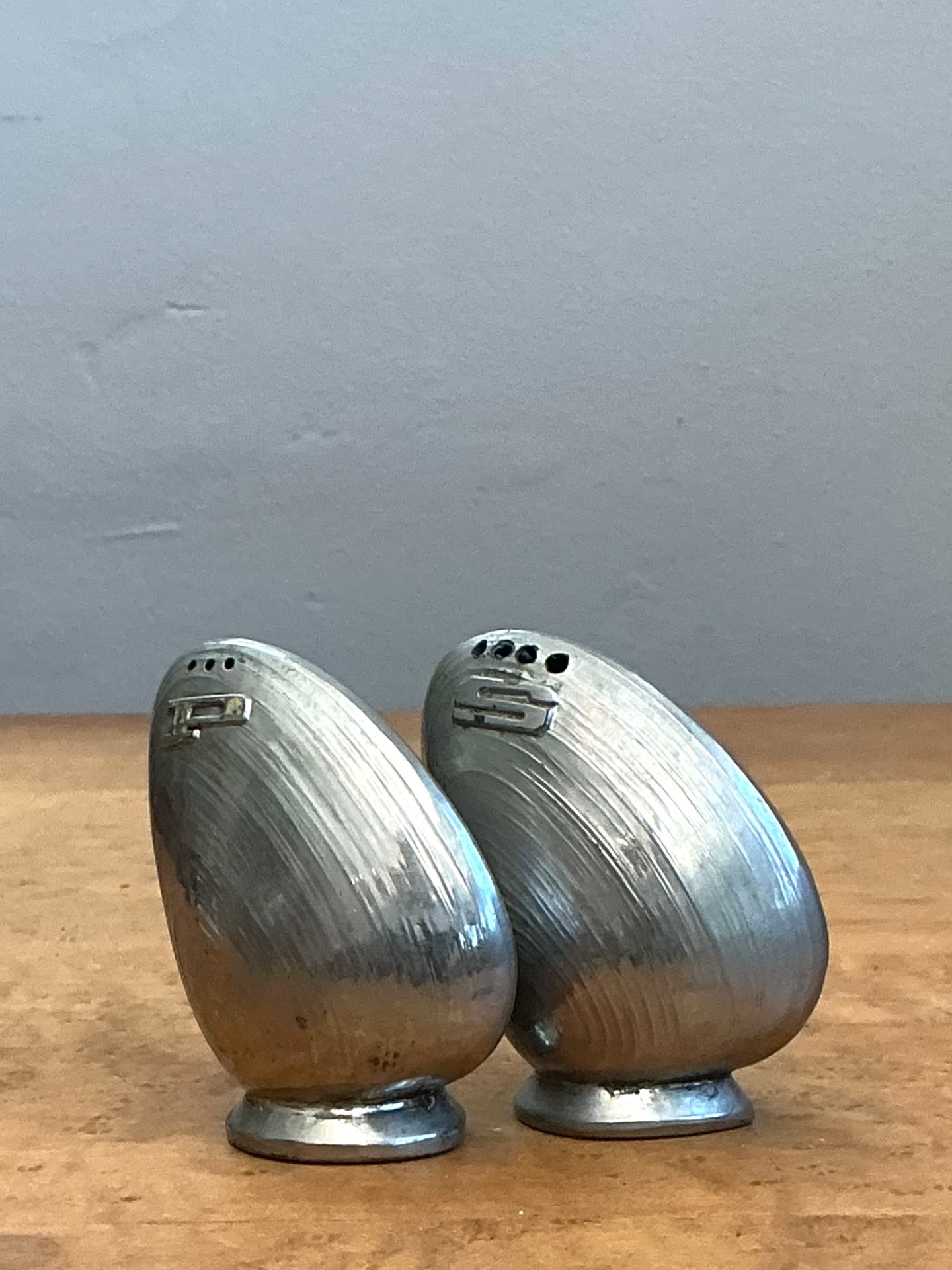 Vintage Metal Clamshell Salt and Pepper Shakers - Back view