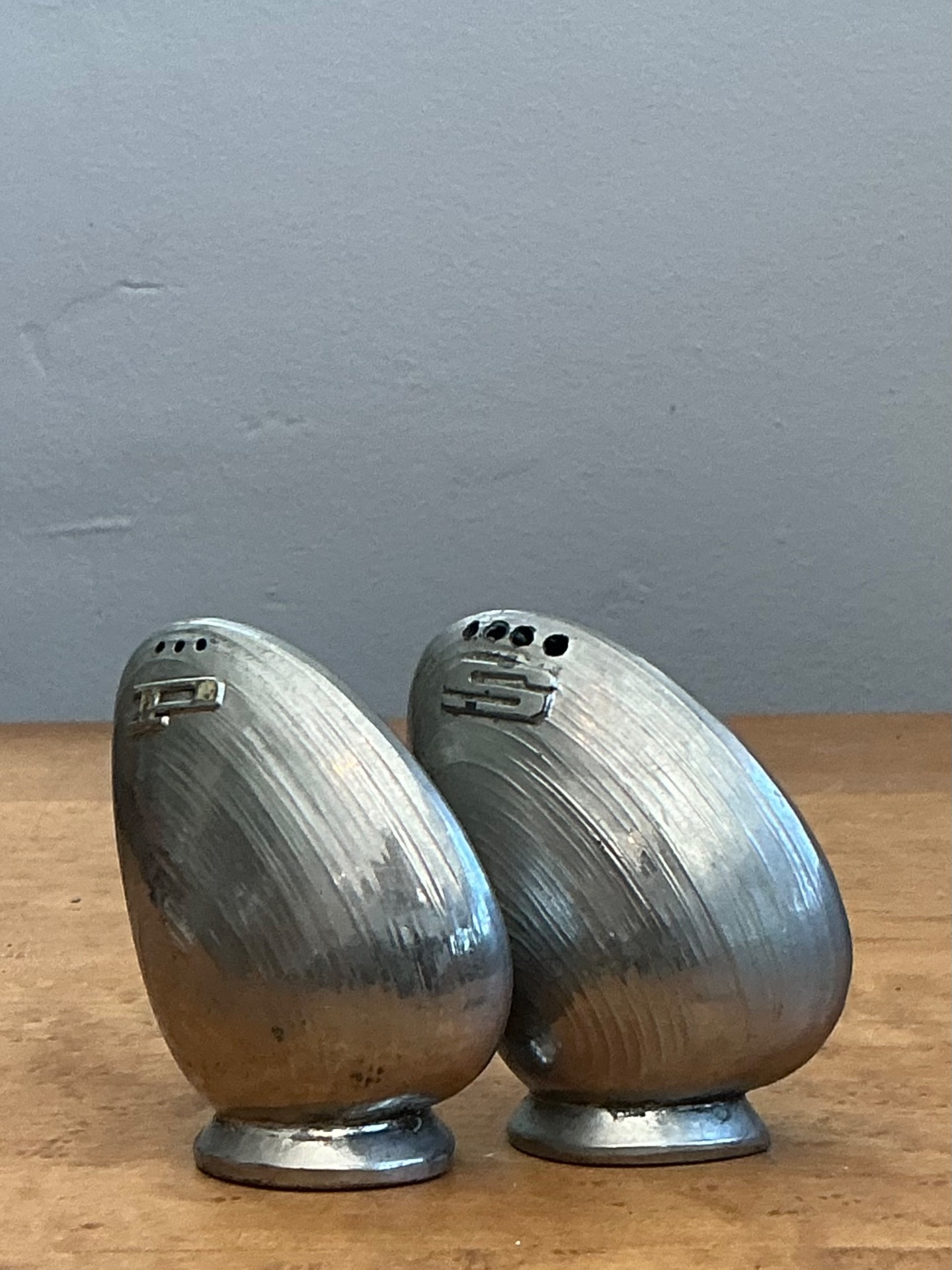 Vintage Metal Clamshell Salt and Pepper Shakers - Back view