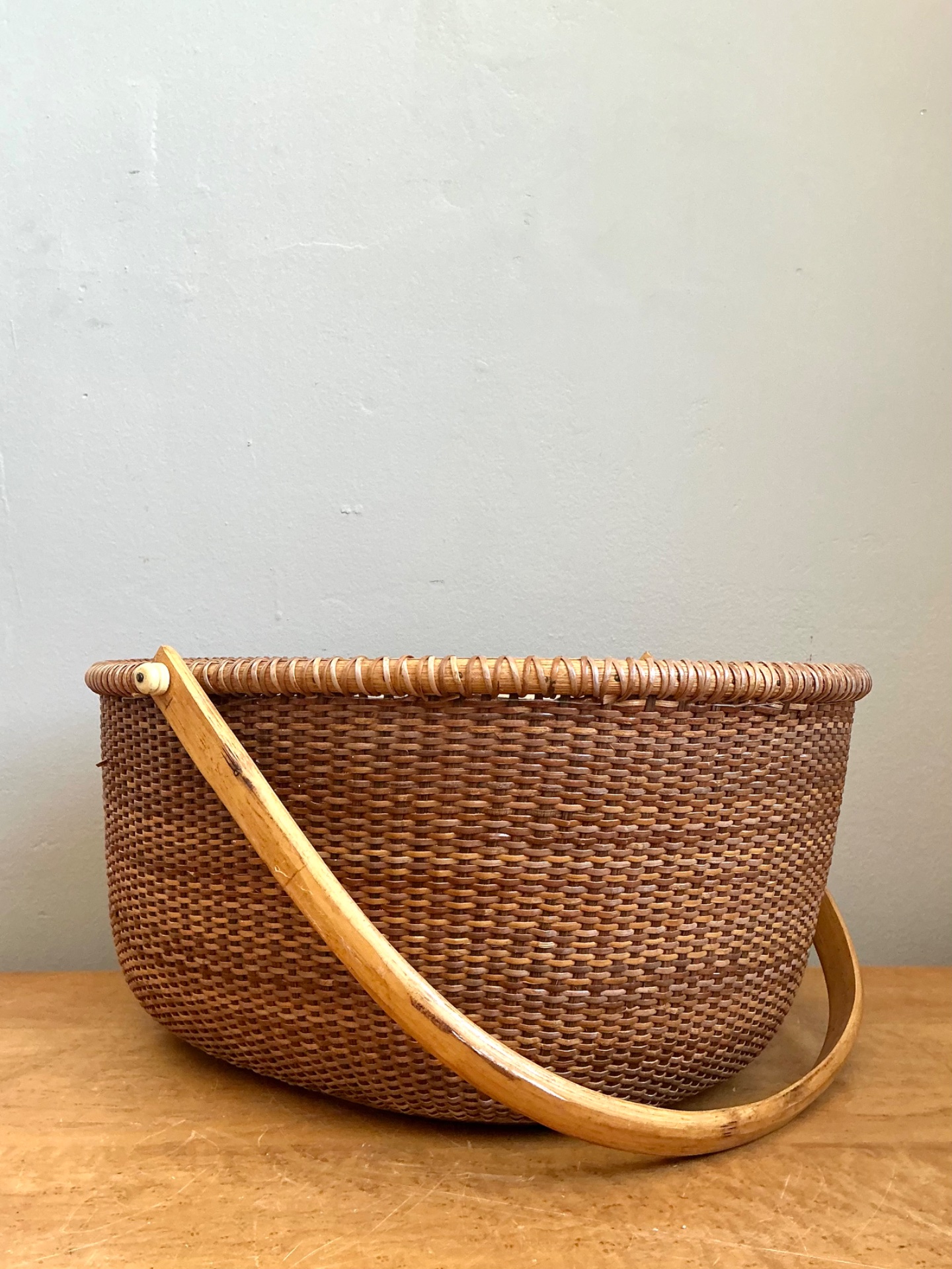 Vintage Shaker Handled Woven Rattan Basket - Side view