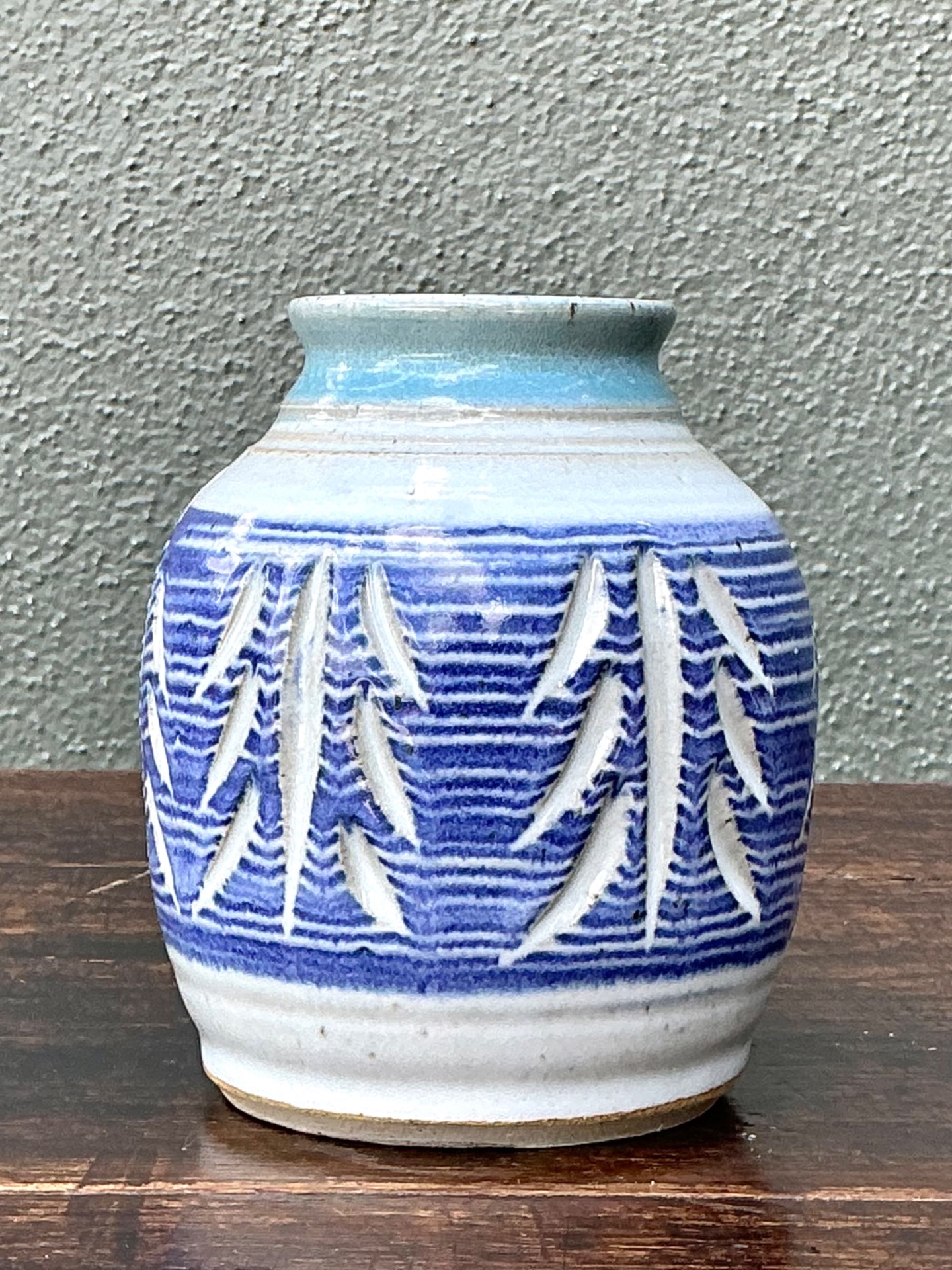 Handcrafted Blue Ceramic Leaf Motif Vase - Side view