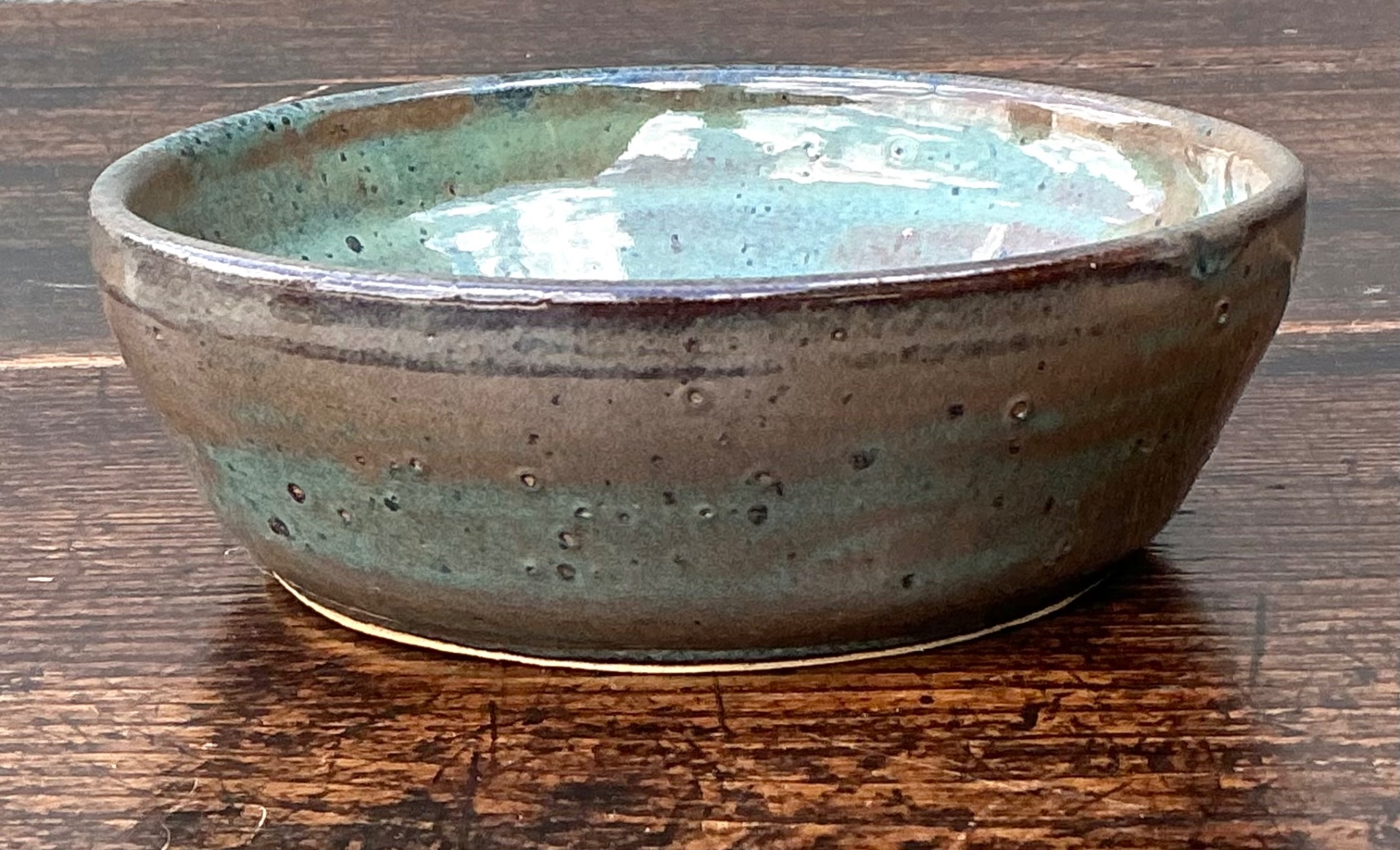 Handcrafted Speckled Green Ceramic Bowl - Back view