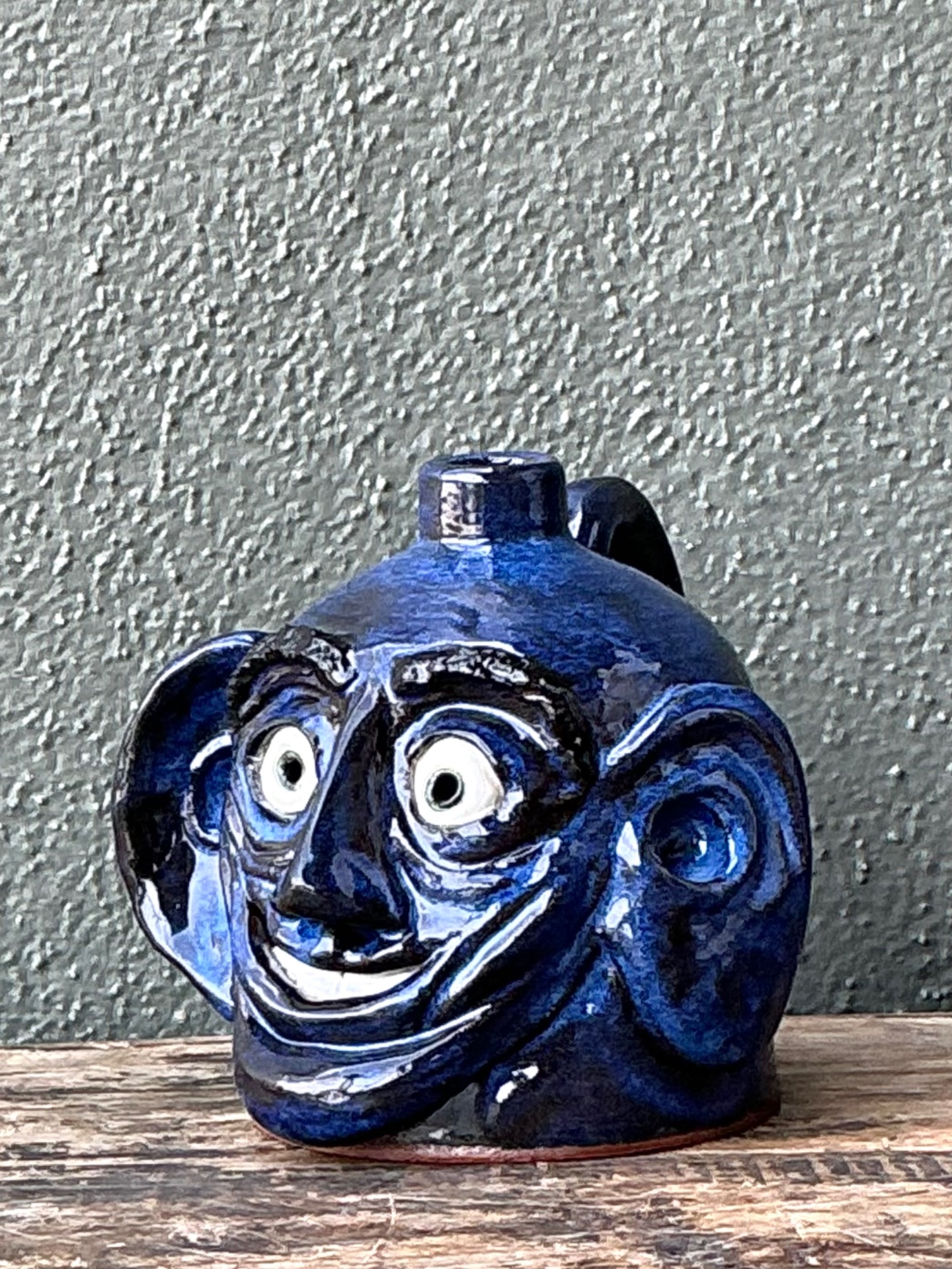 Vintage Blue Glazed Ceramic Face Jug - Top view