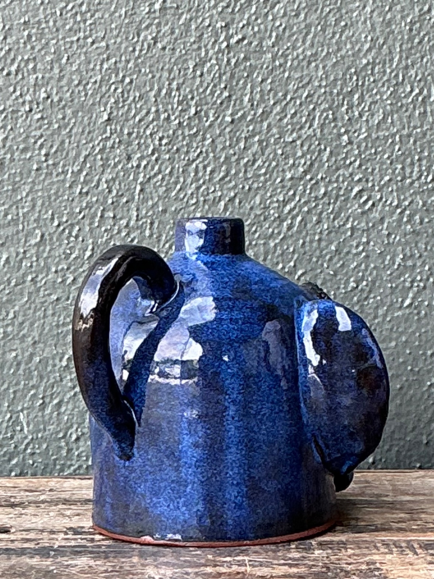 Vintage Blue Glazed Ceramic Face Jug - Side view