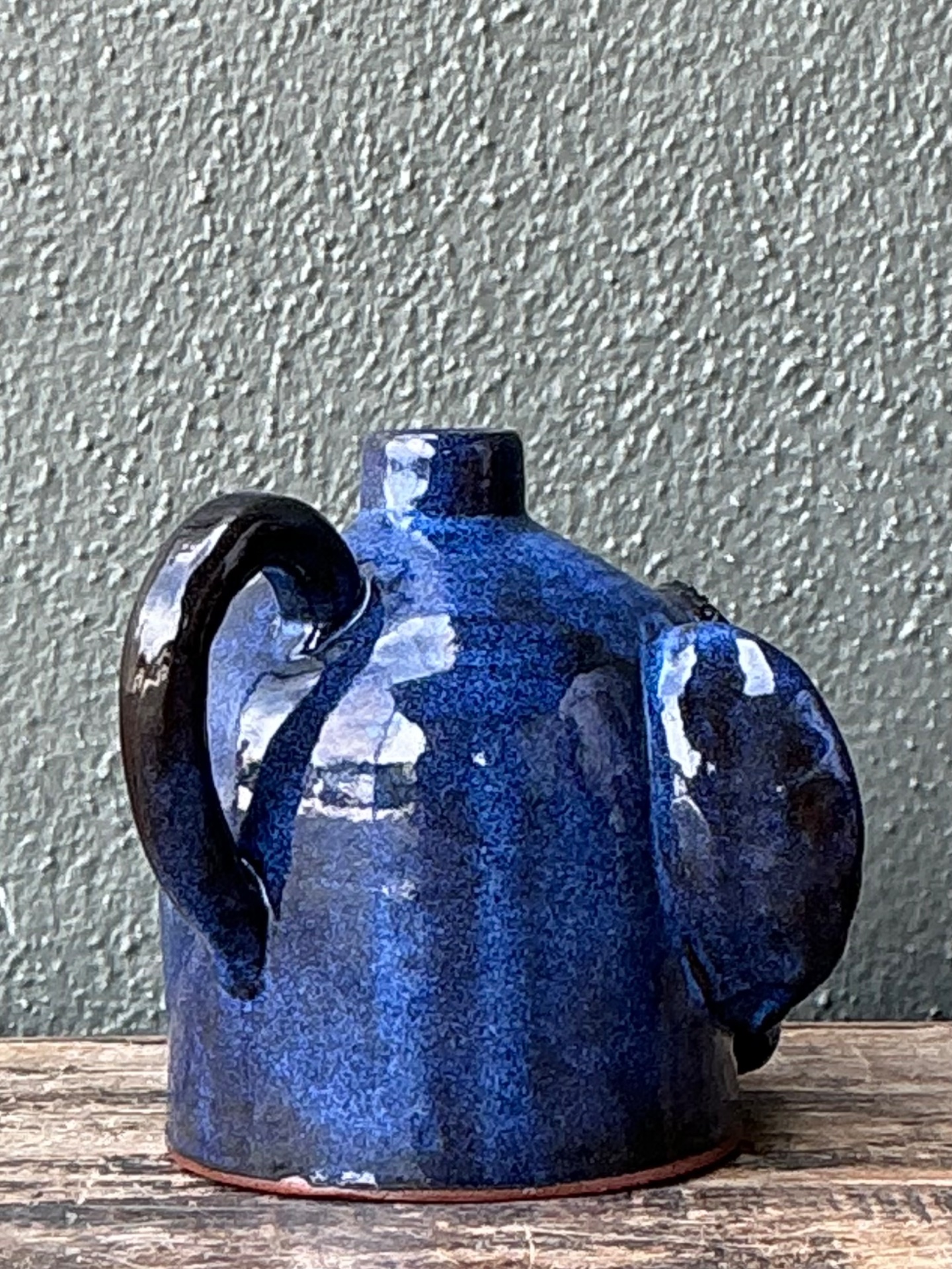 Vintage Blue Glazed Ceramic Face Jug - Detail view