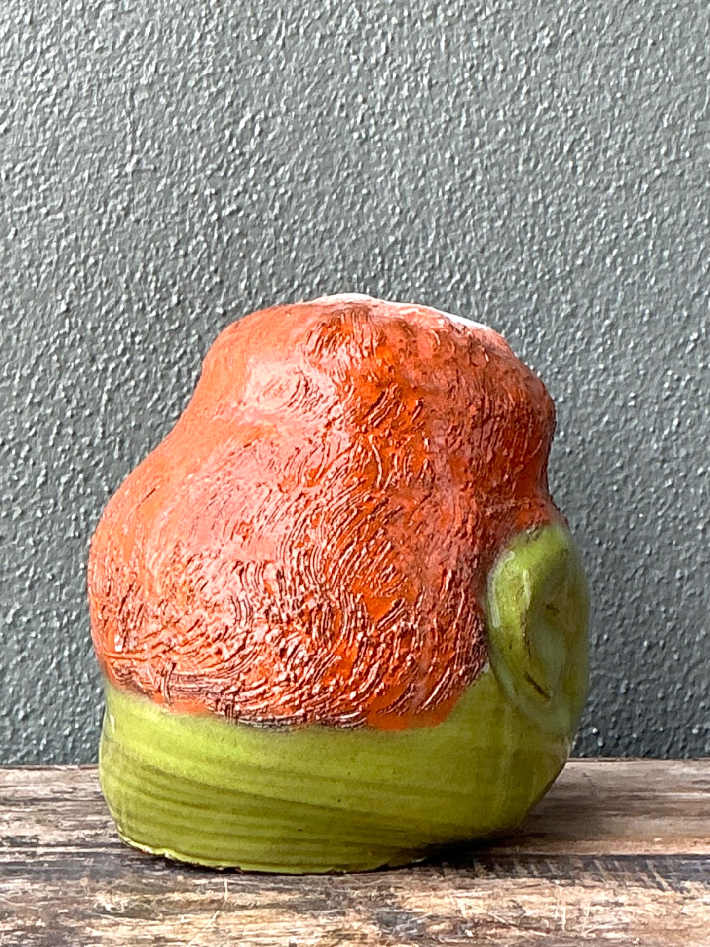 Vintage Handcrafted Green Ceramic Face Jug - Top view