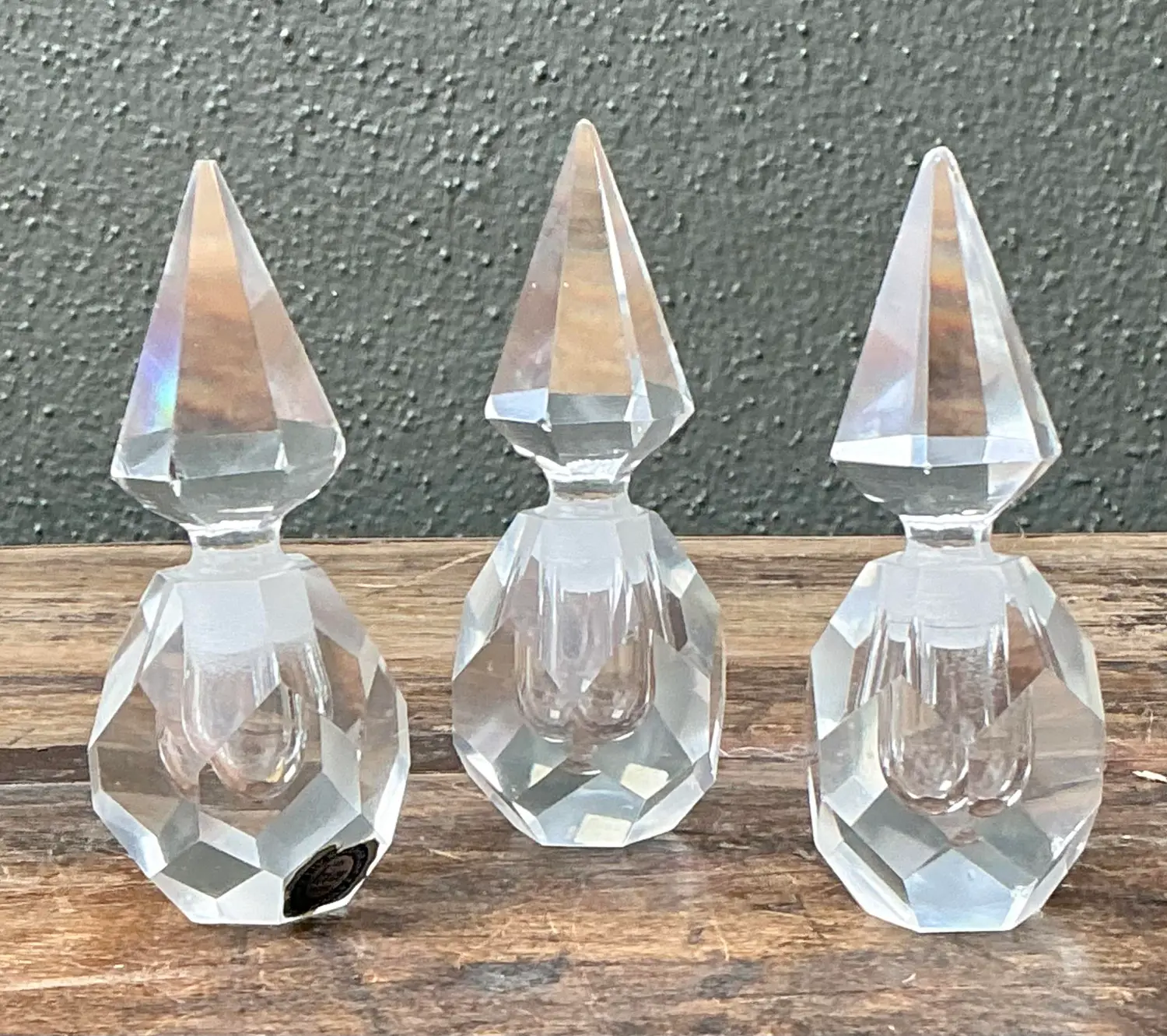 Vintage Trio of Faceted Crystal Perfume Bottles - Top view