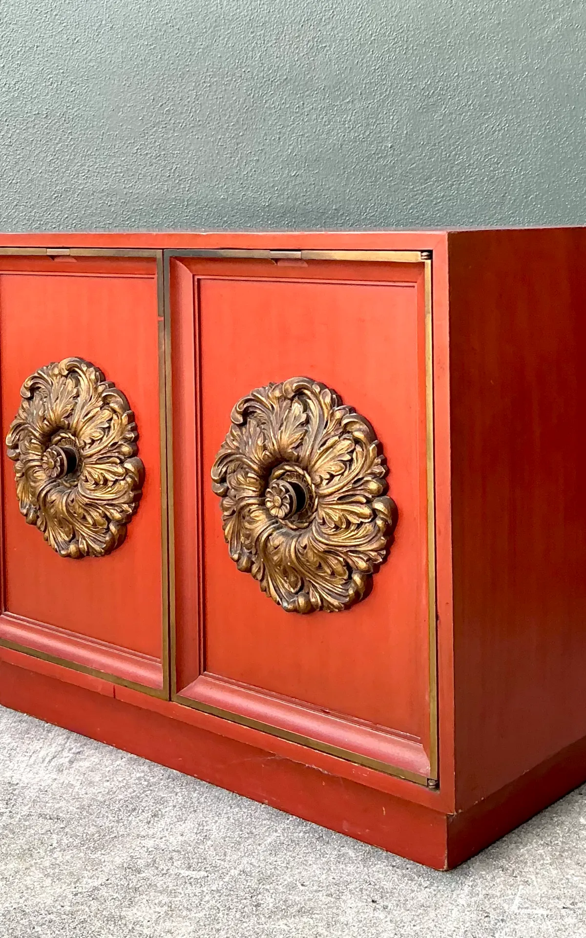 Vintage Lane Red Cabinet with Ornate Medallions - Angle view