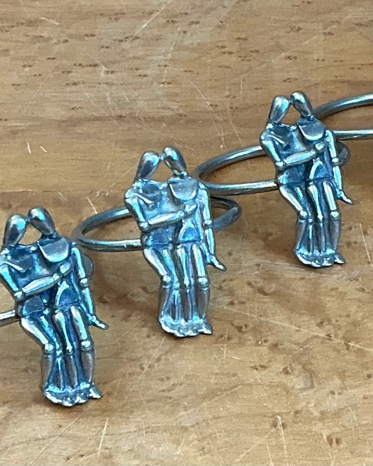 Vintage Embracing Figures Napkin Rings - Interior view