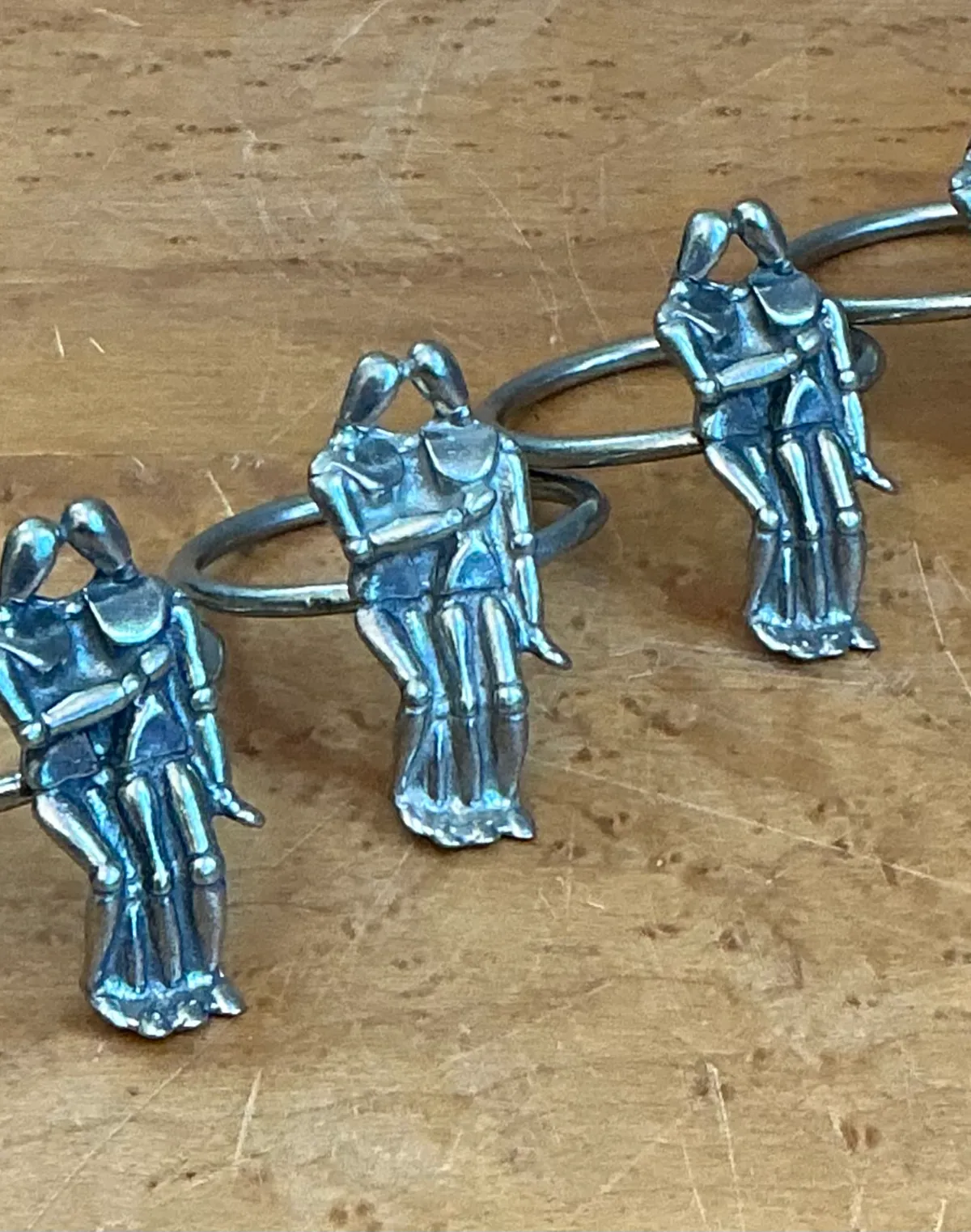 Vintage Embracing Figures Napkin Rings - Angle view