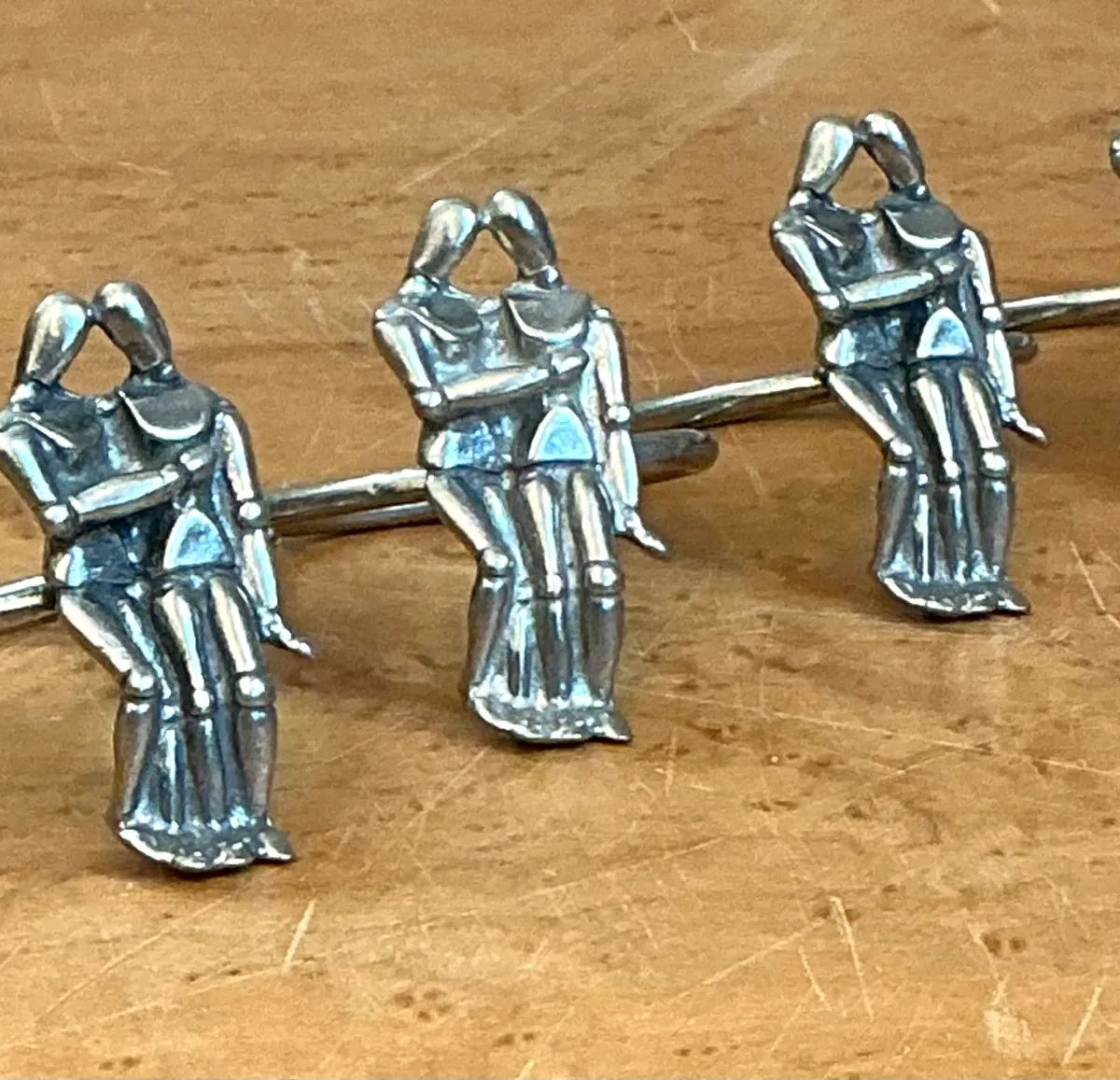 Vintage Embracing Figures Napkin Rings - Bottom view