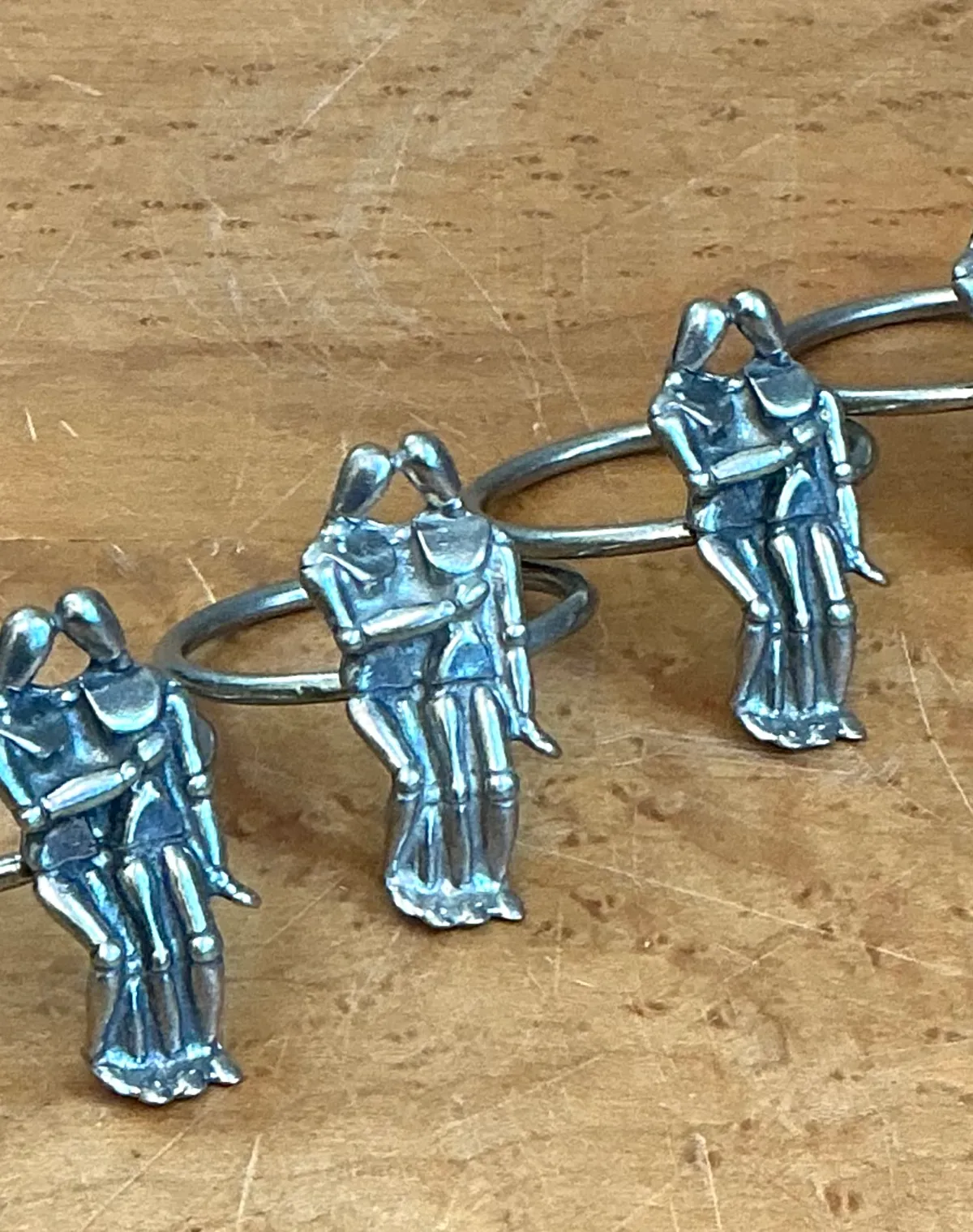 Vintage Embracing Figures Napkin Rings - Top view
