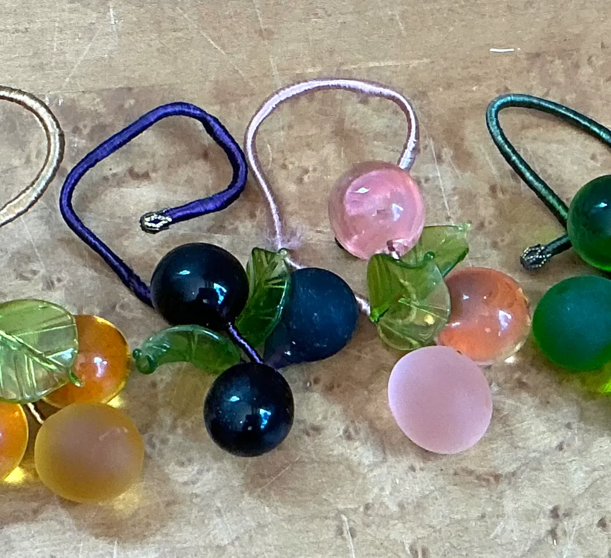 Vintage Glass Fruit Charms with Leaves Napkin Rings - Side view