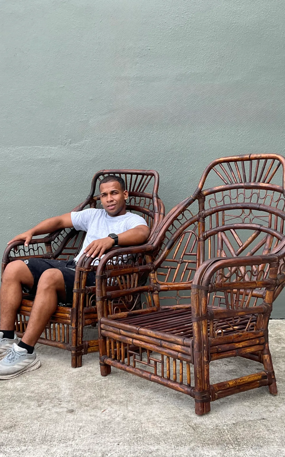 Vintage High Back Brighton Rattan Lounge Chairs - A Pair - Angle view
